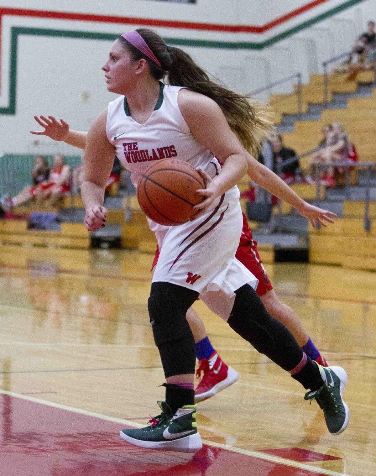 The Woodlands guard Julia Glandt looks to pass Tuesday in The Woodlands.
