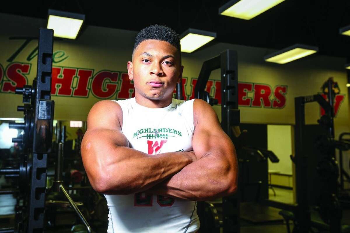 Antoine Winfield, Jr., poses for a portrait inside The Woodlands football weight room. Winfield is The Courier’s Montgomery County Player of the Year.