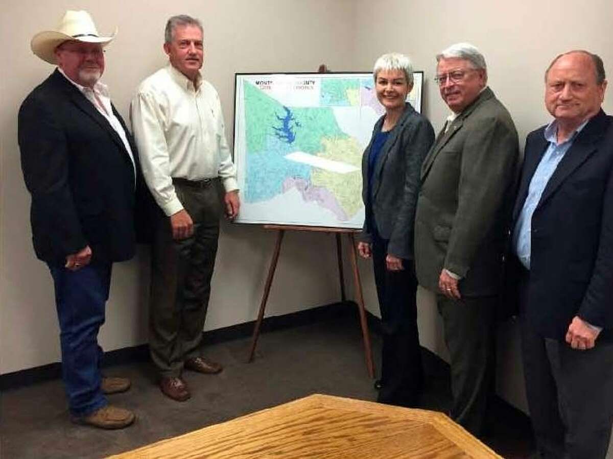 This photo (left to right) of Precinct 2 Commissioner Charlie Riley, County Judge Craig Doyal, Texas Patriot PAC members Julie Turner, Bill O’Sullivan and Jon Bauman was sent with a press release issued Aug. 21 by Doyal’s office announcing the group had reached an agreement on a $280 million road bond.