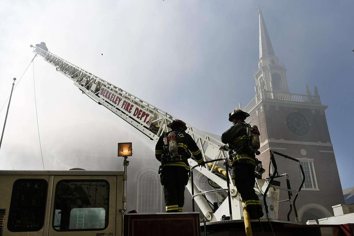 Firefighting crews from Berkeley, Albany, Marinwood, Oakland, and Alameda County battle a 3 alarm fire at the historic First Congregational Church in Berkeley, CA Friday, September 30, 2016.