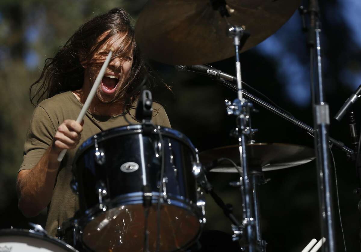 Cake lead singer John McCrea offers charged commentary at Hardly