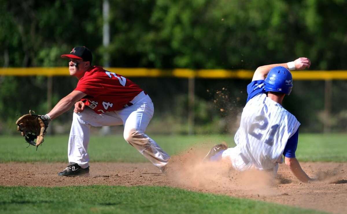 Fairfield Ludlowe's Bill Malone slides into second as Greenwich's Michael Dunster waits for the ball during their game Wednesday May 5, 2010 at Kiwanis field in Fairfield.