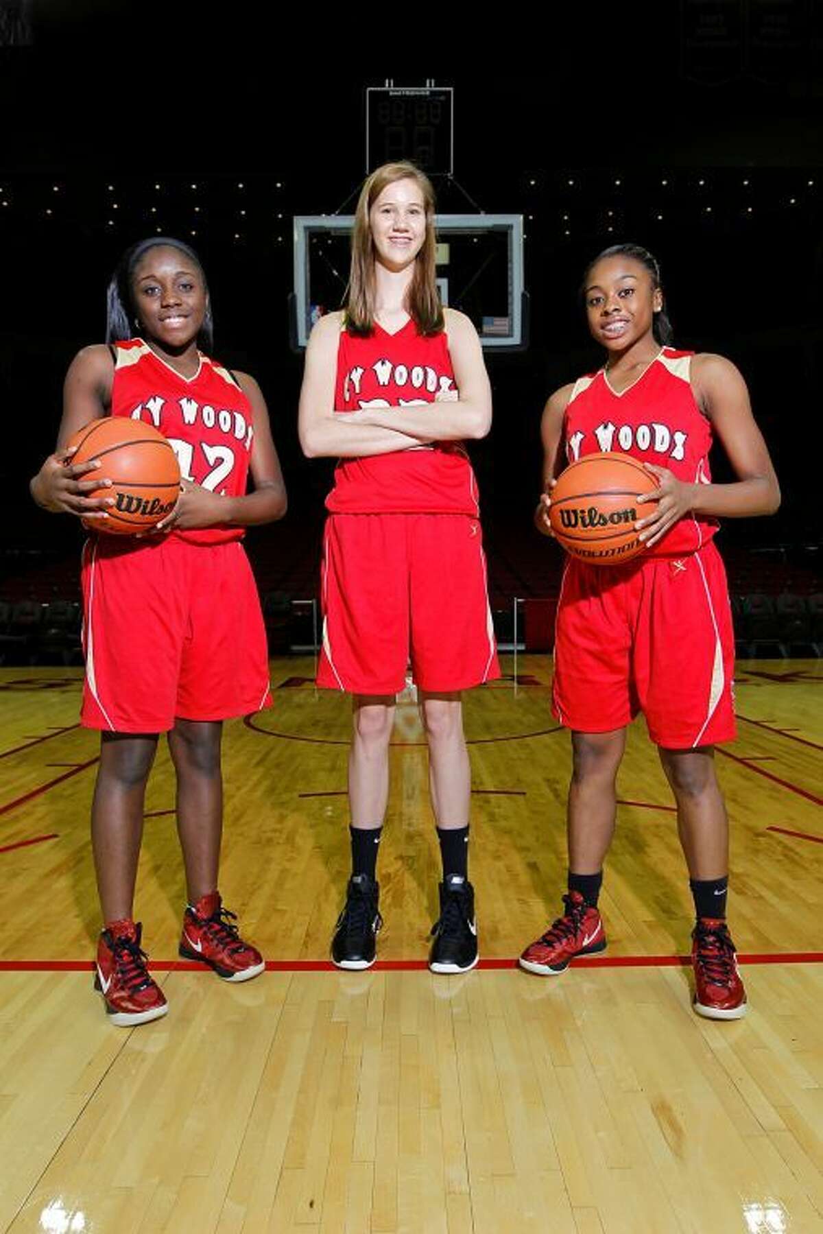 Along with Nancy Mulkey, Olivia and Erica Ogwumike have high hopes for Cy Woods girls' basketball this season.