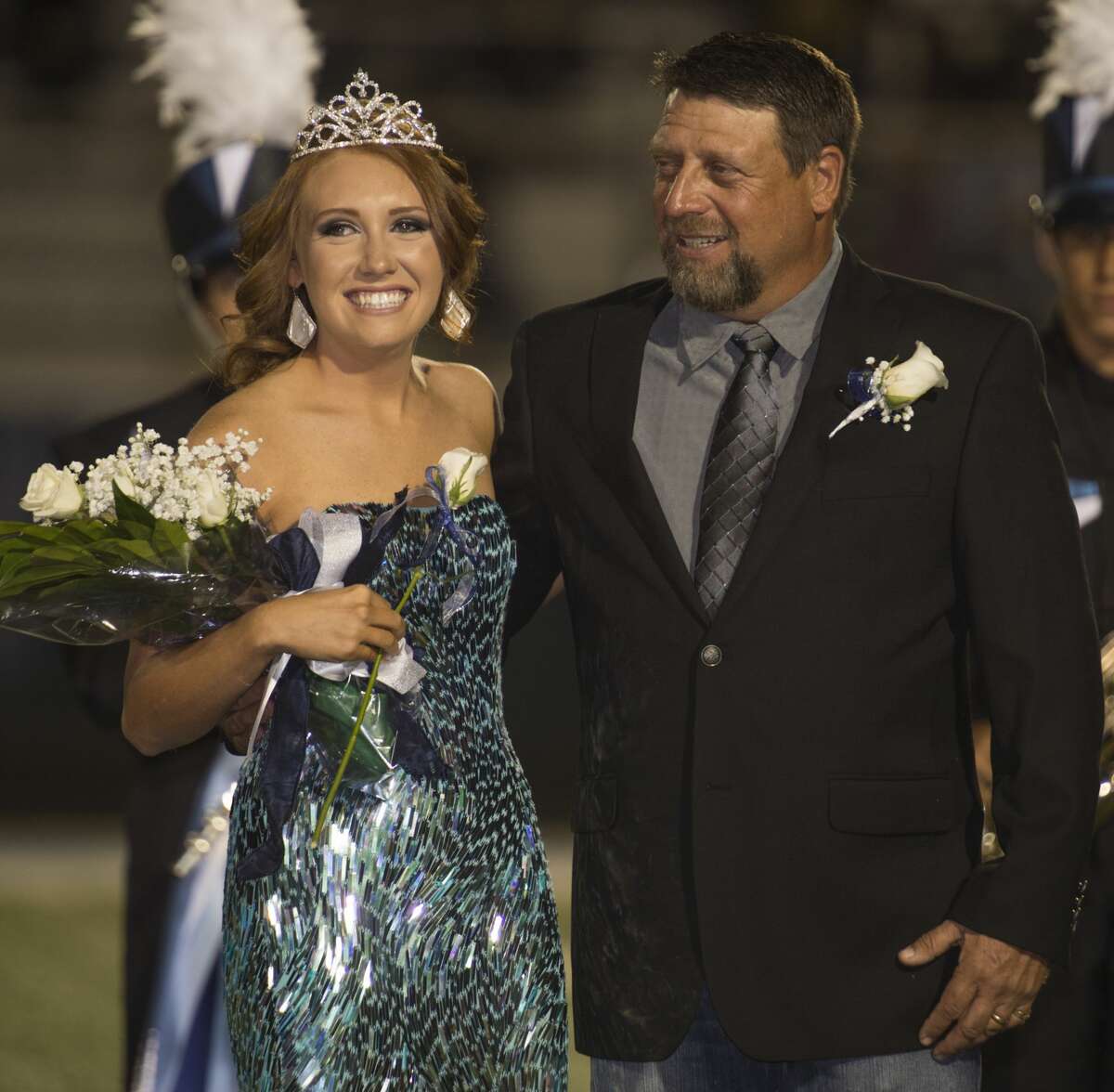 Jenna Fader, escorted by her father Shannon Fader, was crowned Greenwood 2016 Homecoming Queen Friday 09-30-16. Tim Fischer/Reporter-Telegram