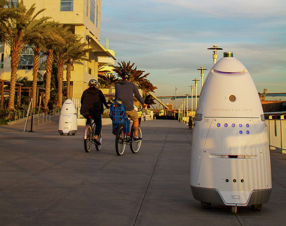 Knightscope K5 security robots patrol alongside a pier in San Diego. The robots are designed to sense intruders at odd hours.﻿ One in working in Mountain View las week was assaulted, police said.