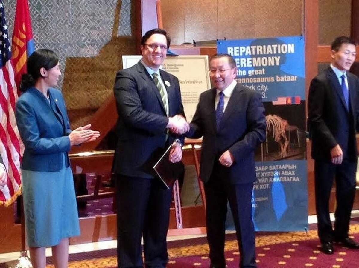 President Elbegdorj bestows the Order of the Polar Star in recognition of Robert Painter's successful representation of the President and Government of Mongolia that led to the repatriation the great Tyrannosaurus bataar fossil, which had been illegally smuggled out of the country.