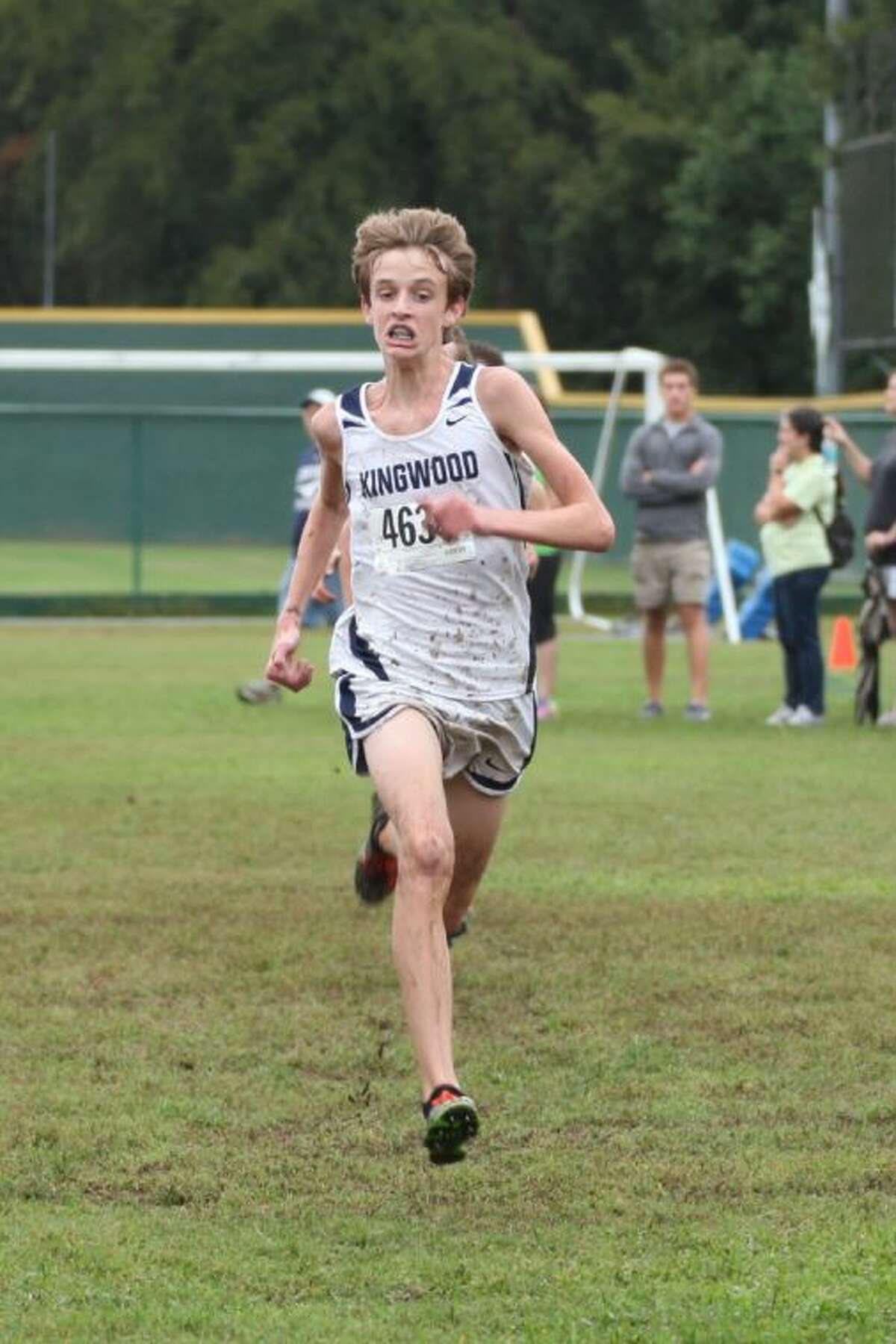 Kingwood junior varsity runner Harry Bellow competes at the Andy Wells Invitational at Kingwood High School on Saturday.