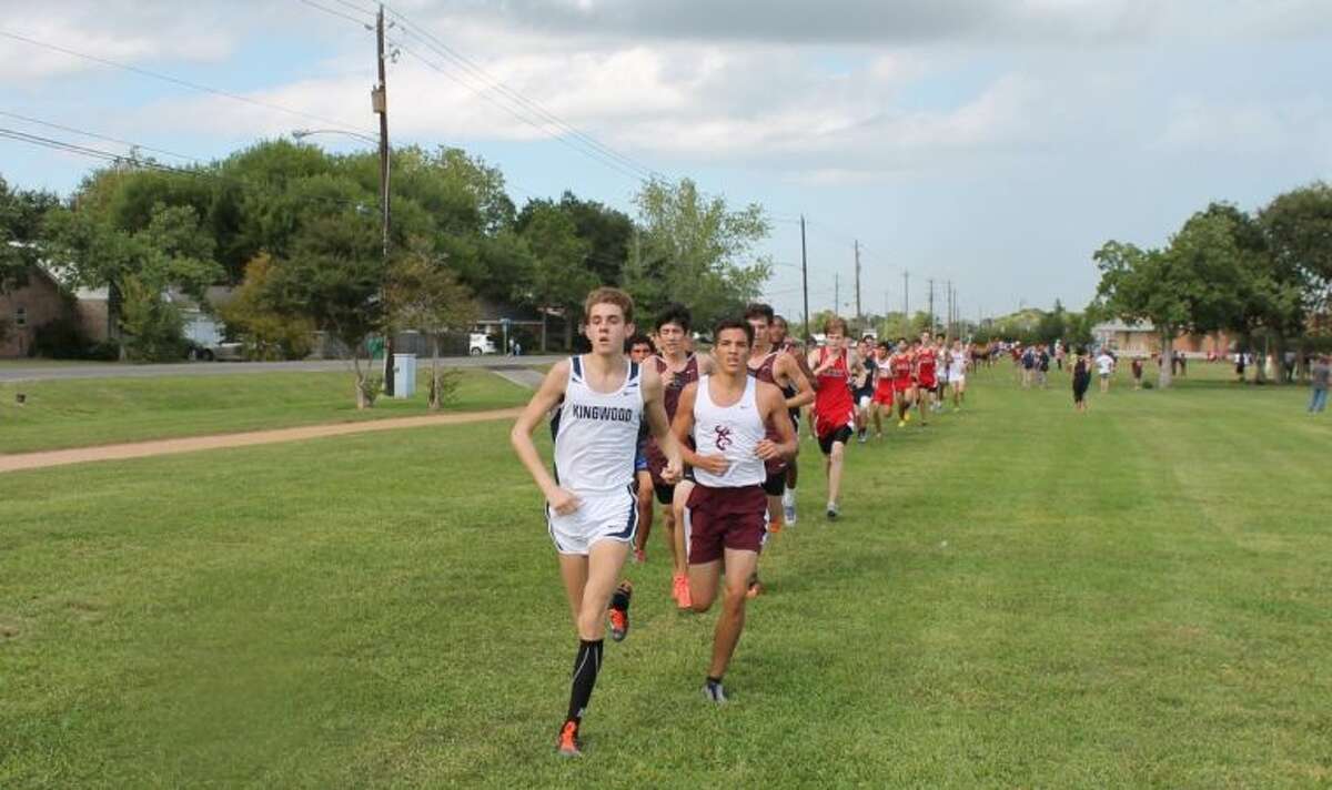 Mustang Grant Tillinghast works his way through the pack at the Clear Lake Invitational on Friday where Kingwood took home its second team title in as many weeks.
