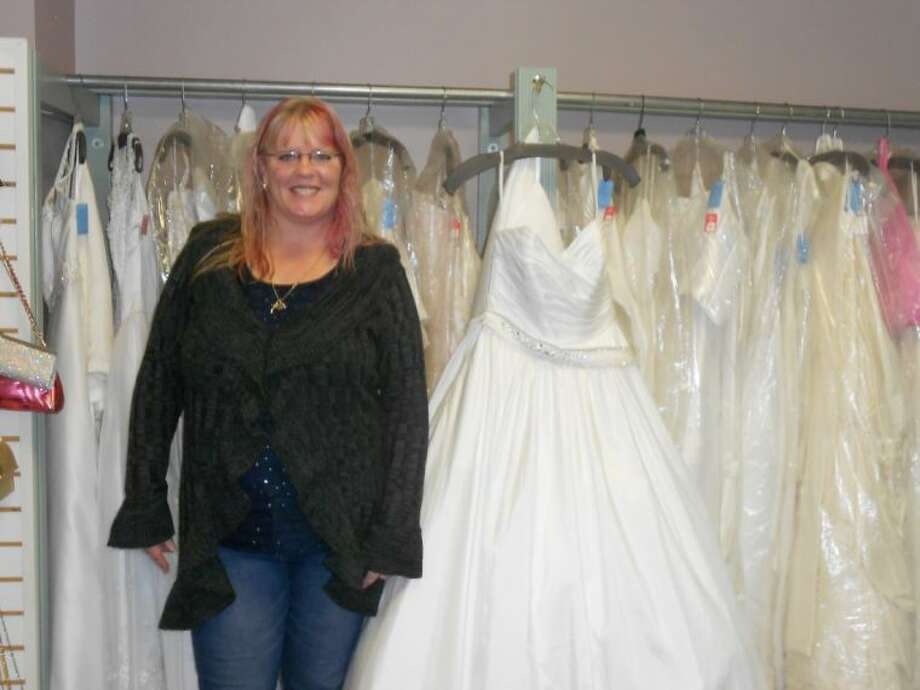 Bridal Opens Under New Name Owner Houston Chronicle Shy Allen Faulkner Displays Some Of The Wedding Dresses That Can Be Found In Her