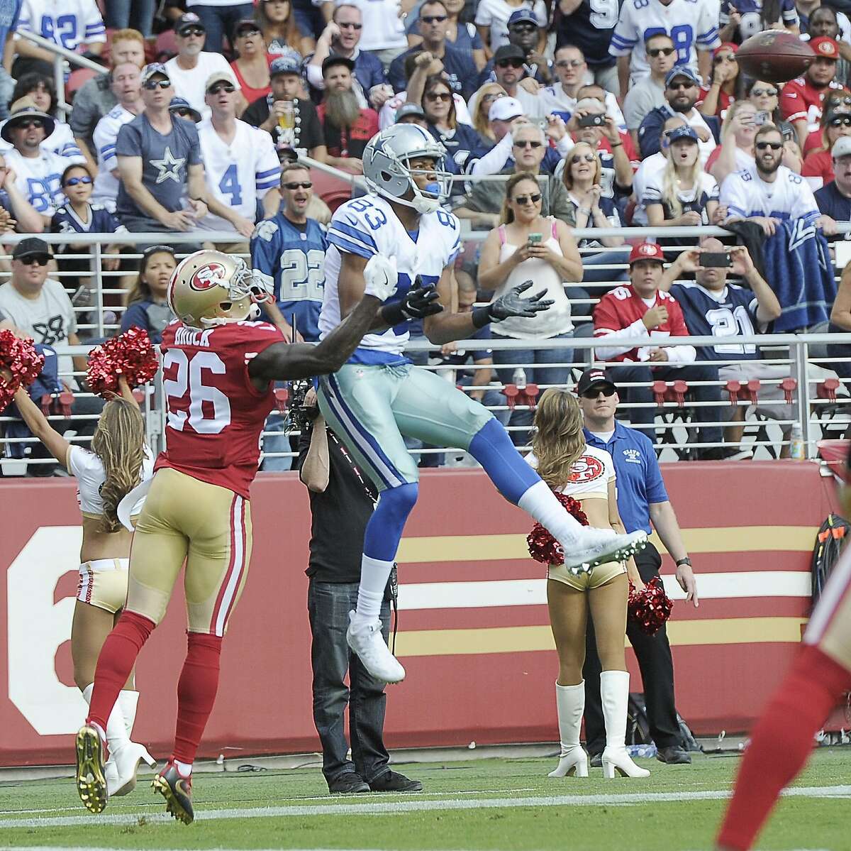 Dallas Cowboys wide receiver Terrance Williams (83) catches a touchdown pass in front of San Francisco 49ers cornerback Tramaine Brock (26) during the second quarter on Sunday, Oct. 2, 2016 at Levi's Stadium in Santa Clara, Calif. (Max Faulkner/Fort Worth Star-Telegram/TNS)