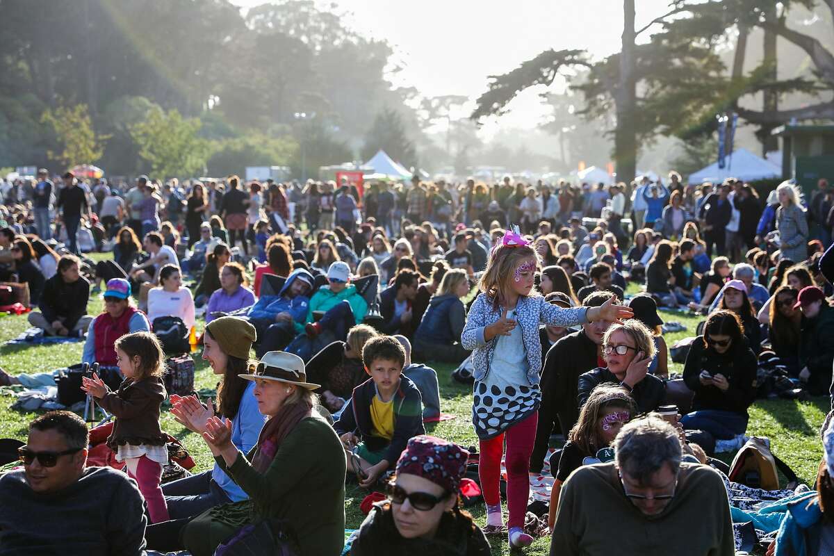 Thousands of people gather to listen to music at the Hardly Strictly Bluegrass music festival in Golden Gate Park in San Francisco, California, on Sunday, Oct. 2, 2016.