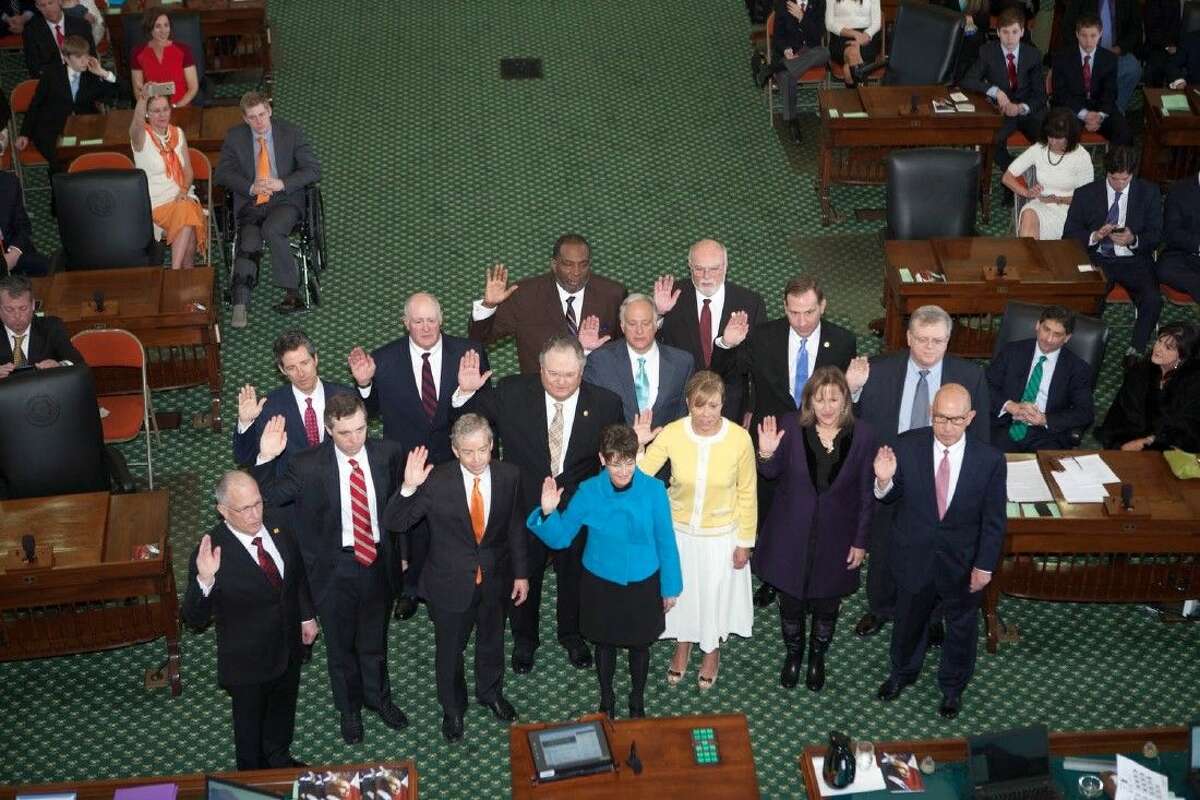 Senator Robert Nichols (Texas Senate District 3) was among a group of other Texas senators sworn into office on Jan. 13 at the State Capitol. Nichols is pictured third from the right on the back row.