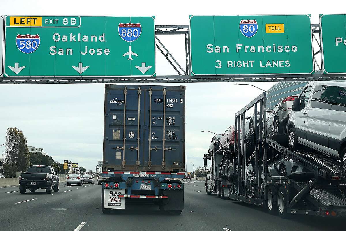 View of signs and traffic at the 880/80 split on Monday, October 3, 2016, in San Francisco, Calif.