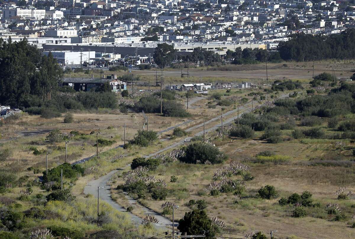 An old railroad right-of-way slices through open space land between Bayshore Boulevard and Highway 101 in Brisbane, Calif. on Thursday, Sept. 3, 2015. The Baylands mixed-use development project is planned for the 660-acre site.