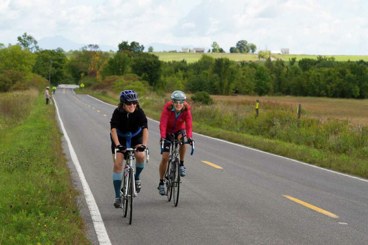 More than 100 riders, supporters, and community members turned out for the first Bike the Barns, a 50-mile loop in and around the Adirondack community of Keeseville on Sept. 24. The event celebrates the Champlain Valley's farming culture. (Adirondack North Country Association.)