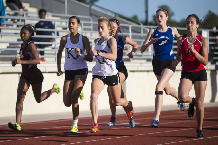 GIRLS TRACK AND FIELD Summer Creek tops Kingwood Park by a point for