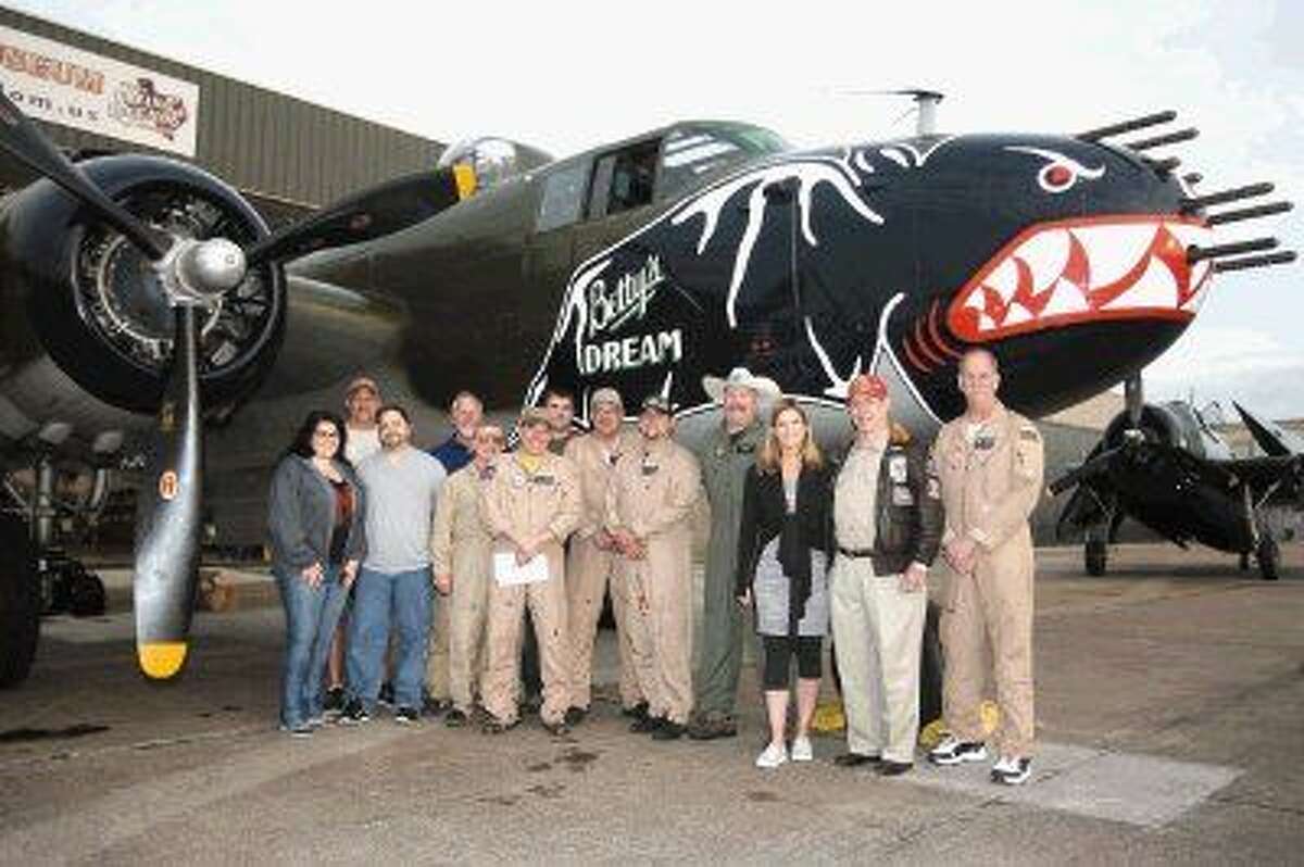 The pilots and flight crew with the Texas Flying Legends Museum pose for a photo before they fly to the 2015 St. Barth’s Bucket Regatta.