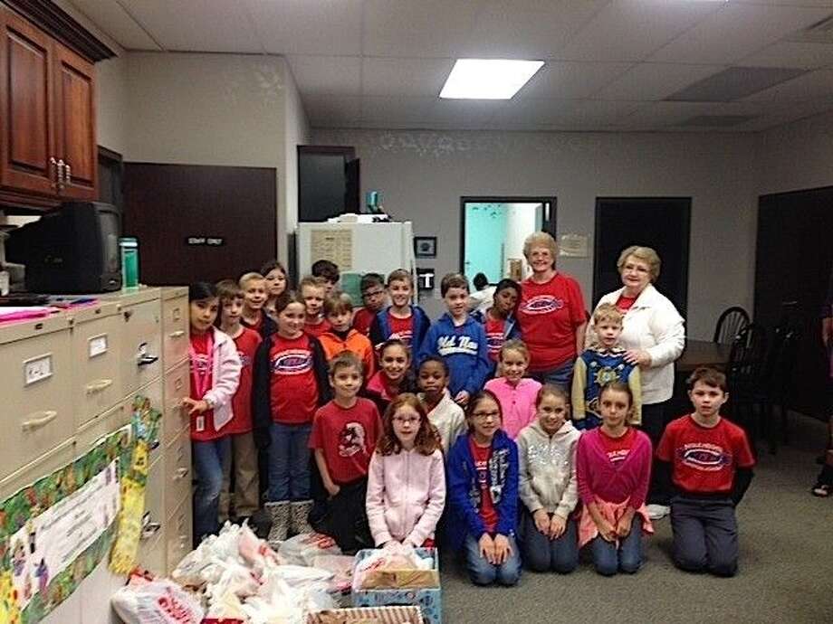 eagle-heights-third-graders-collect-1-000-books-for-christian-helping