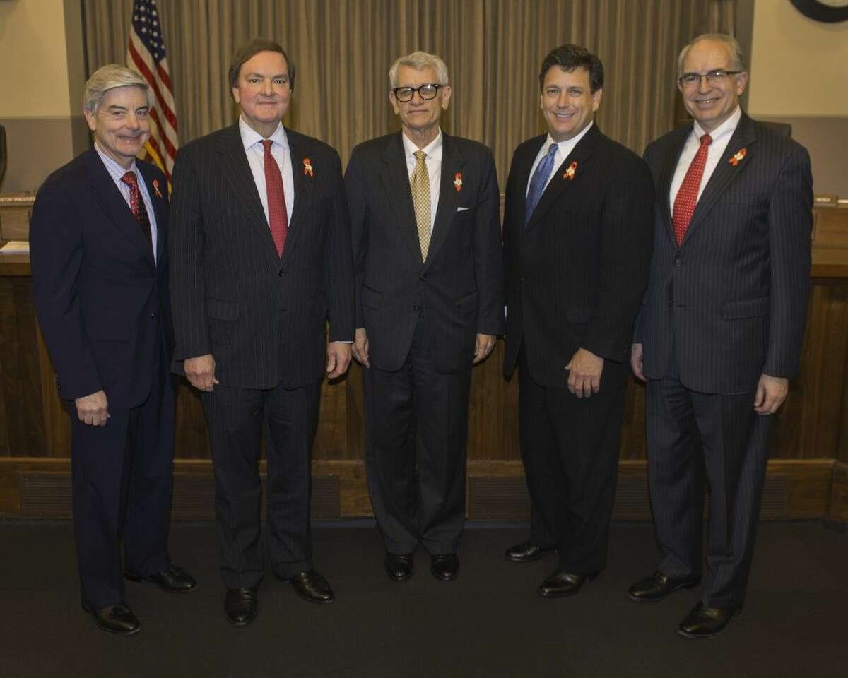 Chairman Tryon Lewis (center) and Commissioner Bruce Bugg (second from left) met yesterday in Austin for their first Texas Transportation Commission meeting. The commission approved the award of the first batch of projects funded by Proposition 1. From left to right: Commissioner Victor Vandergriff; Commissioner Bruce Bugg; Chairman Tryon Lewis; Commissioner Jeff Austin III; and Commissioner Jeff Moseley.