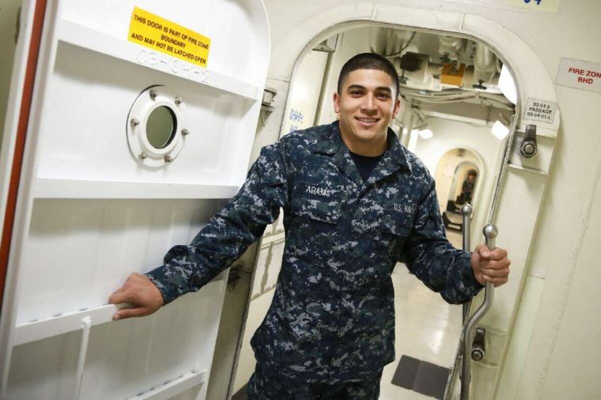 Airman Dale Adams, a 2011 Oakridge High School graduate from Spring, is serving in the U.S. Navy aboard one of the world's largest warships, the San Diego-based aircraft carrier USS Ronald Reagan (CVN 76).