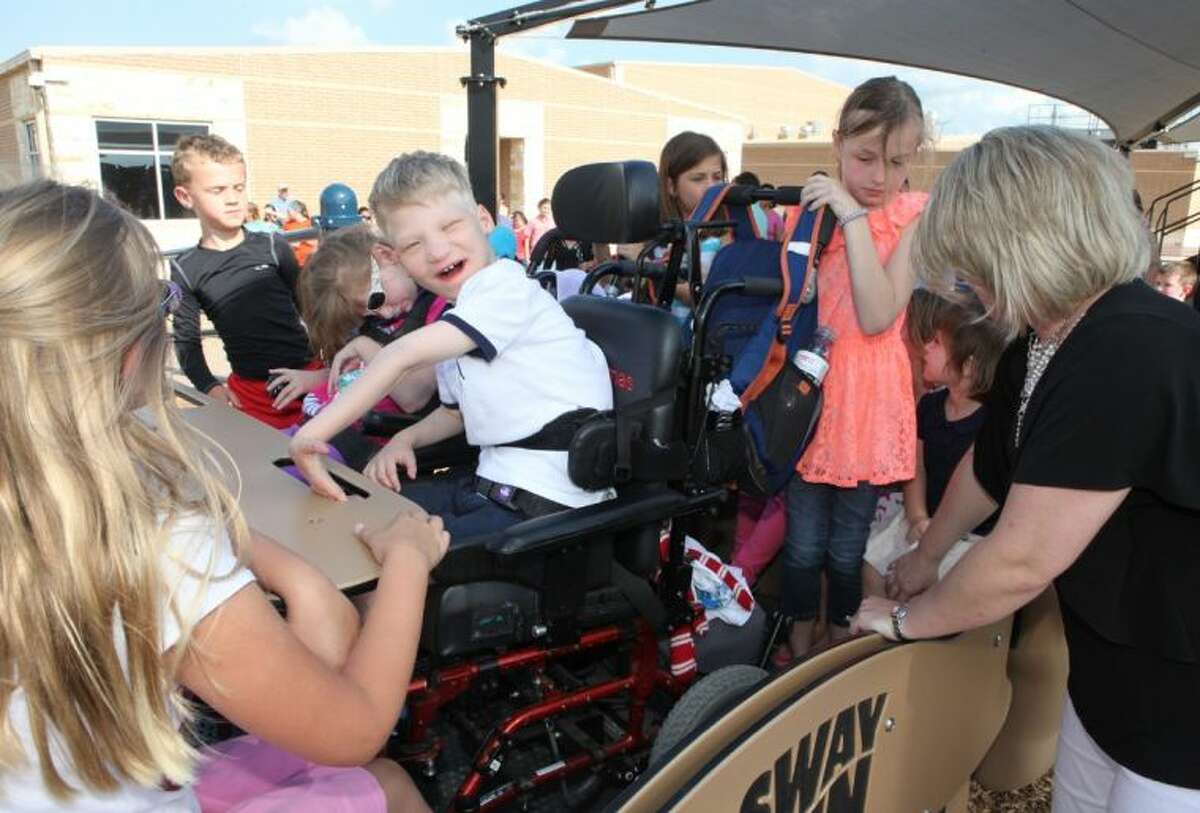 Katy ISD students cut the ribbon on special playground