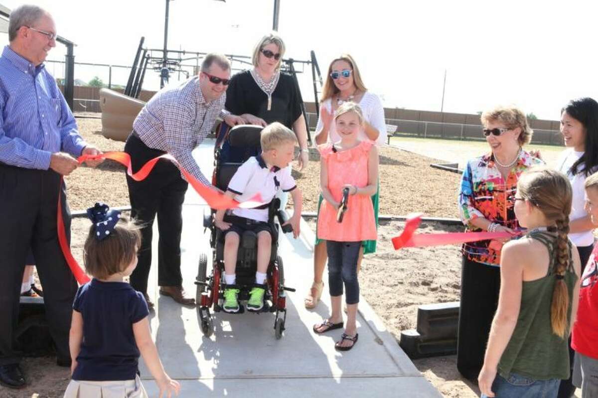 Katy ISD students cut the ribbon on special playground