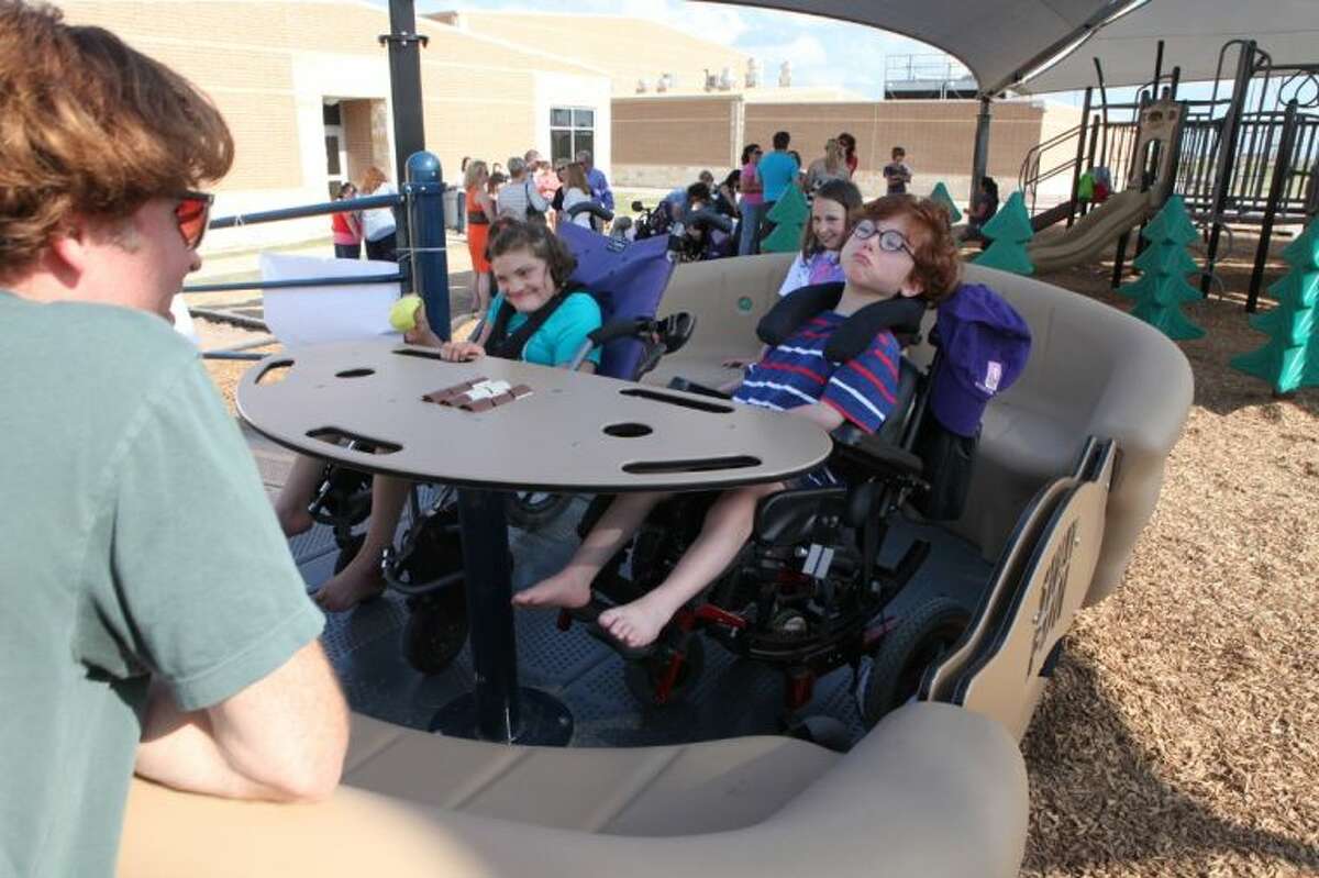 Katy ISD students cut the ribbon on special playground