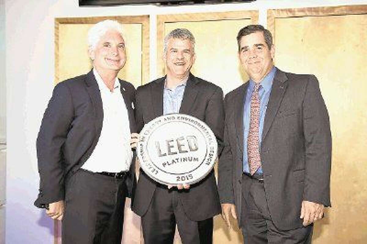 Roger Platt, President, USGBC; Glenn Fuhrman, AIA, LEED Green Associate, Vice President of Design and Construction, MetroNational; Loc McNew, President & Chief Operating Officer, MetroNational at USGBC Plaque Ceremony for The Treehouse Double LEED Platinum on Tuesday, April 21st; Photo Courtesy of MetroNational.