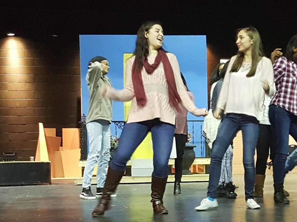 The Atascocita High School Fine Arts department rehearses for their January performances of “Hairspray.” Karen Grentz as lead “Tracy Turnblad” and Madison Kansteiner as “Penny Pingleton” dance in a musical number at rehearsals.
