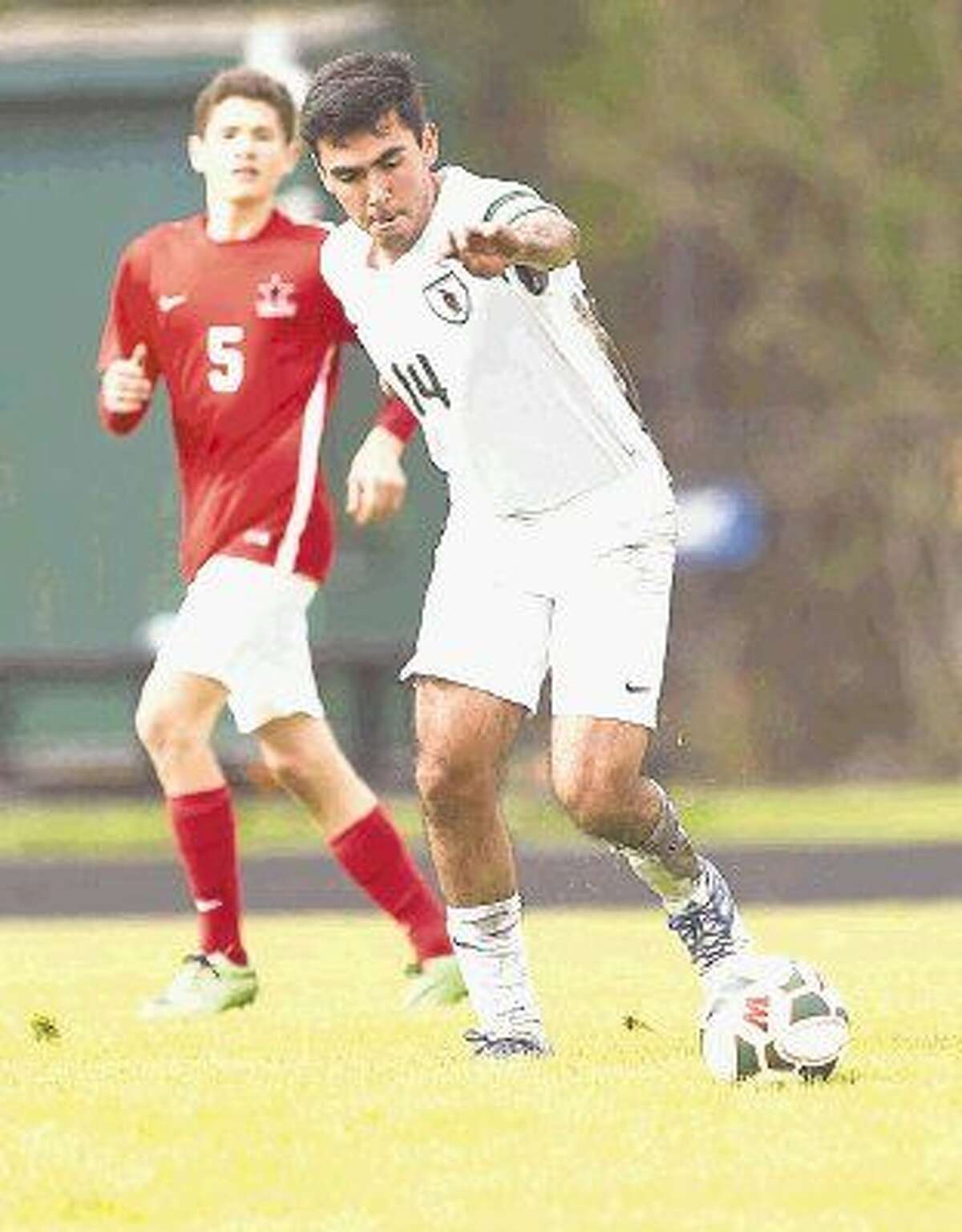 The Woodlands’ Rafael Ortiz controls the ball during the Kilt Cup soccer tournament Saturday. Go to HCNpics.com to purchase this photos, and other like it.