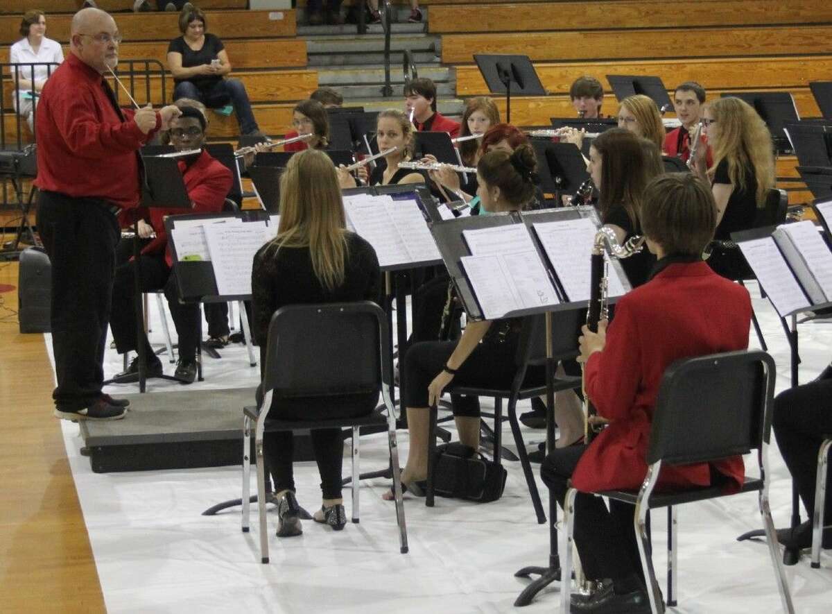 Band Director Peter Muller (left) leads the Coldspring-Oakhurst High School band during the Fine Arts Festival on May 14.