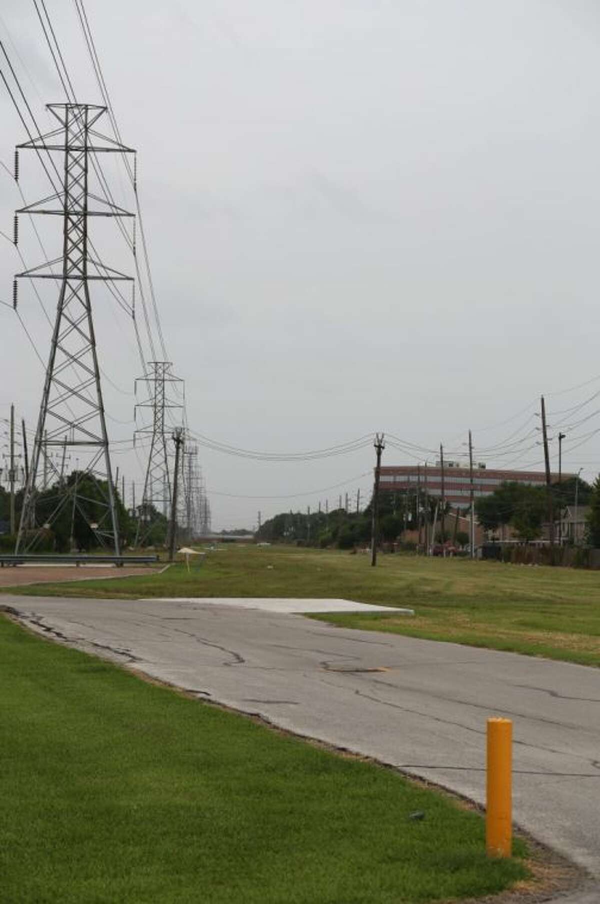 The Westchase District is negotiating with CenterPoint to put a hike and bike trail on this corridor. This view is looking south from near Westheimer toward Richmond.
