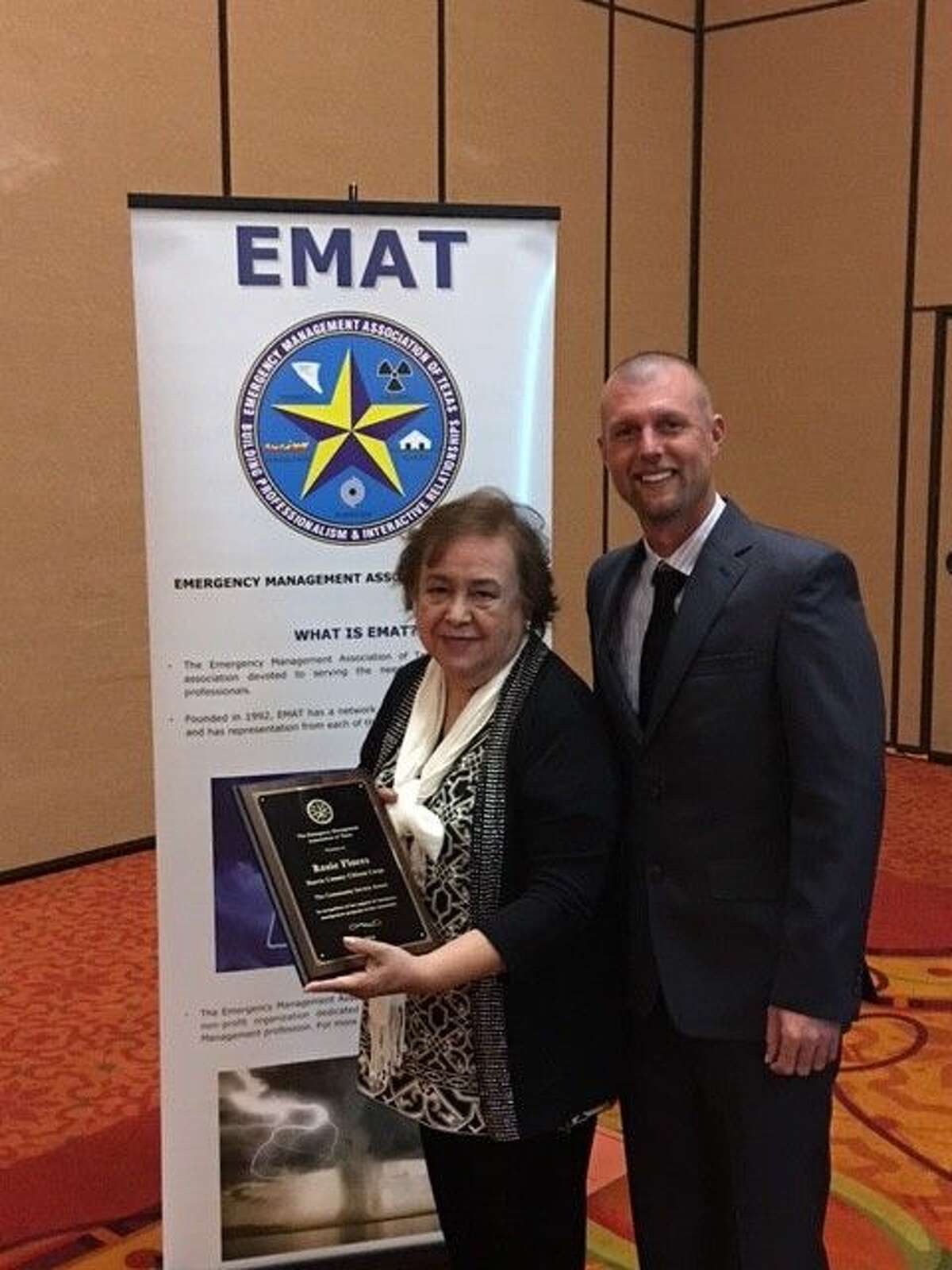 Harris County Teen CERT Coordinator Rosie Flores receives the EMAT Community Service Award from EMAT President Jeb Lacey on Feb. 9 in San Marcos.
