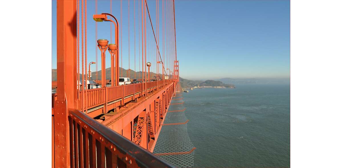 Photo illustration of proposed steel mess suicide barrier for the Golden Gate Bridge. The bids have come in millions of dollars over the bridge district's estimate, raising doubts about the future of the project.