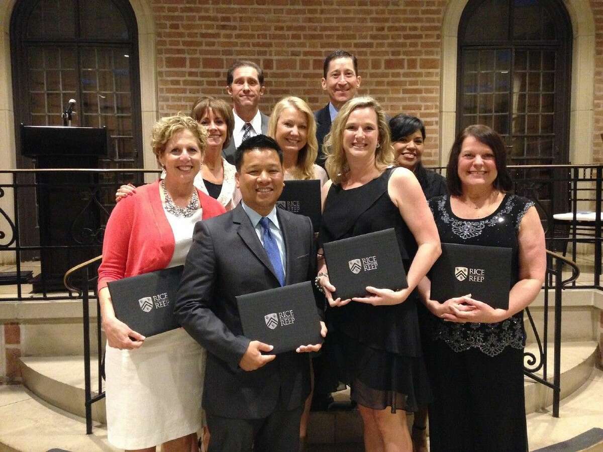 CFISD’s 2015 Rice University Education Entrepreneurship Program (REEP) graduates celebrate their completion of the program on May 12. Pictured (clockwise from bottom) are: Hoang Pham, Cypress Lakes High School assistant principal; Becky Koop, Pope Elementary School principal; Donna Guthrie, assistant superintendent of elementary school administration; Dr. Scott Sheppard, assistant superintendent of secondary school administration; Roy Garcia; associate superintendent of school administration and leadership development; Ana Diaz, Holmsley Elementary School principal; Sherma Duck, Anthony Middle School principal; Maggie Wiley, Cook Middle School principal; and Sandy Trujillo, Cypress Creek High School principal.