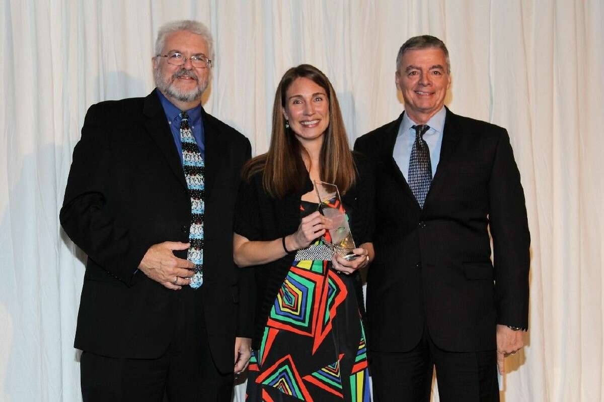 Aerodyne Industries LLC presents President’s Award to Elizabeth Rampe