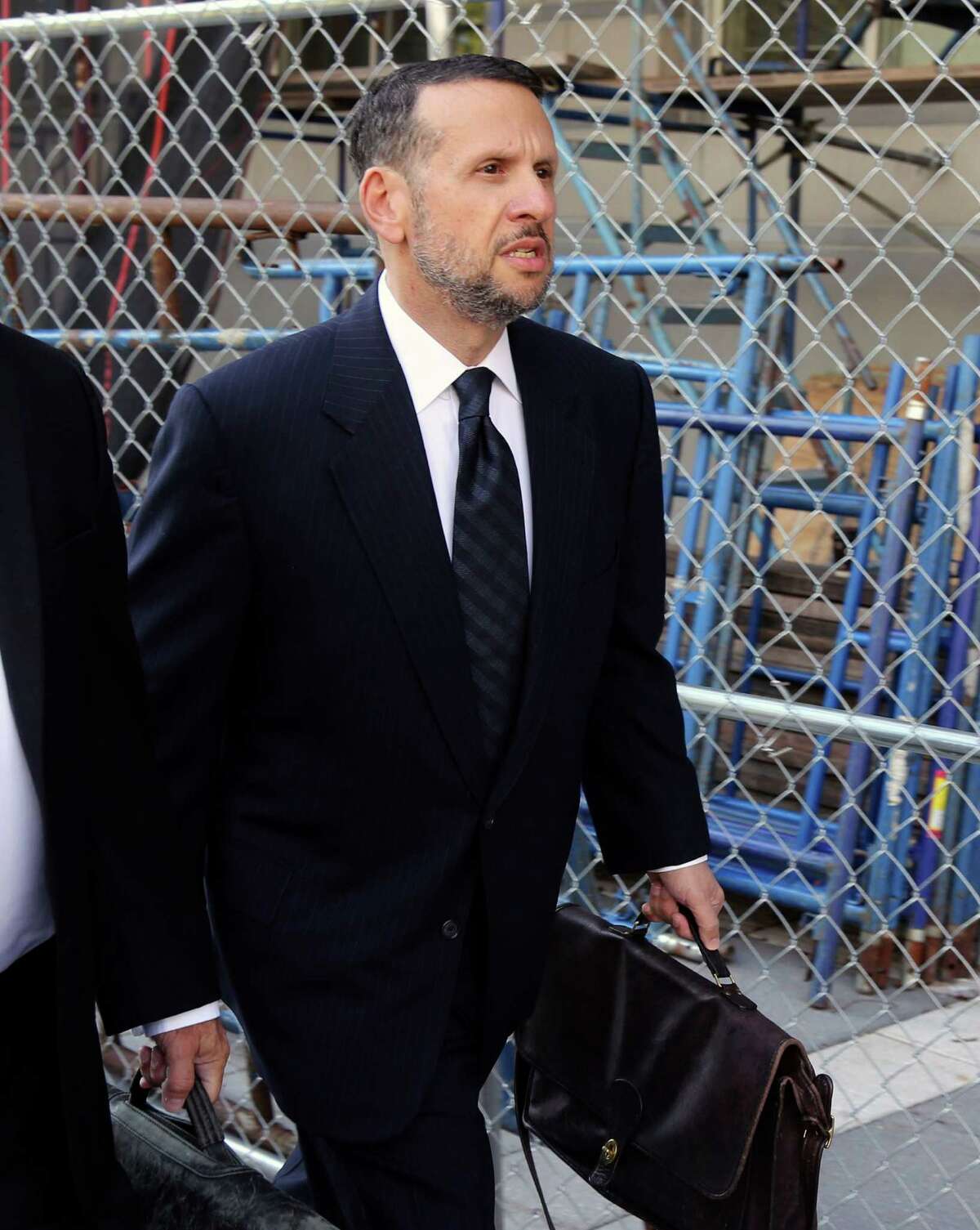 FILE - In a Friday, Sept. 23, 2016 file photo, David Wildstein arrives at the federal courthouse, in Newark, N.J. Wildstein testified Tuesday, Oct. 4, 2016, that New Jersey Gov. Chris Christie and New York Gov. Andrew Cuomo discussed releasing a false report to tamp down questions over the George Washington Bridge lane-closure scandal. (Chris Pedota/The Record via AP, File) ORG XMIT: NJHAC501