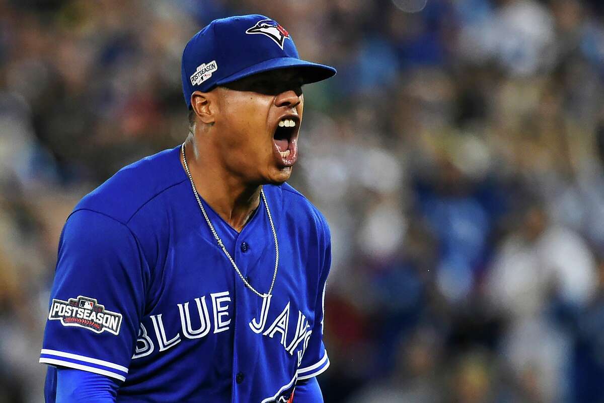 Toronto Blue Jays starting pitcher Marcus Stroman reacts on the mound against the Baltimore Orioles during the sixth inning of an American League wild-card baseball game in Toronto, Tuesday, Oct. 4, 2016. (Nathan Denette/The Canadian Press via AP)