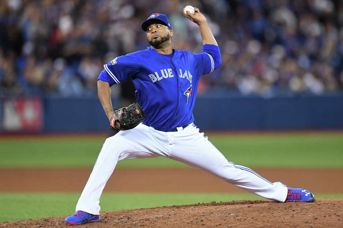 Toronto Blue Jays relief pitcher Francisco Liriano delivers against the Baltimore Orioles during the tenth inning of an American League wild-card baseball game in Toronto, Tuesday, Oct. 4, 2016. (Frank Gunn/The Canadian Press via AP)