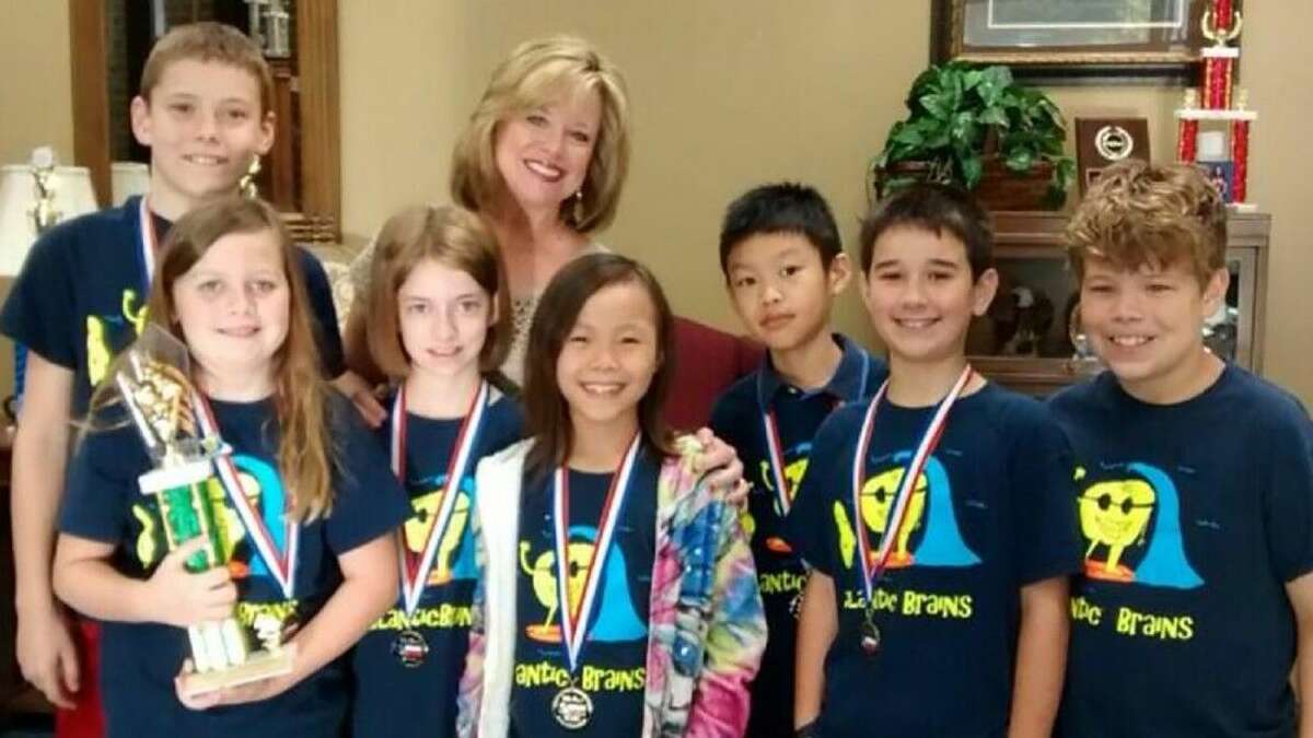 The Adam Elementary Atlantic Brains placed 14th in Laugh Art Loud at the DI Global Finals. Pictured with principal Beth May, from left, are Connor Gallagher, Anna Beasley, Sarah Hart, Lillian Chang, Austin Fang, Connor Rodriguez and Xander McWhorter.