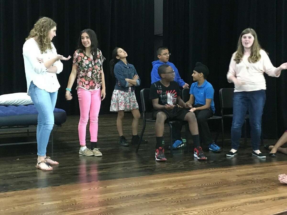 Anthony Middle School students rehearse a scene from their upcoming One Act Play, John Lennon and Me. Pictured, from left, are: Isabella Hall, Maddie Dupont, Amanda Tello, Gabriel Lopez (standing), Jessie Bess, Rajveer Kindra and Ashely Hoover.