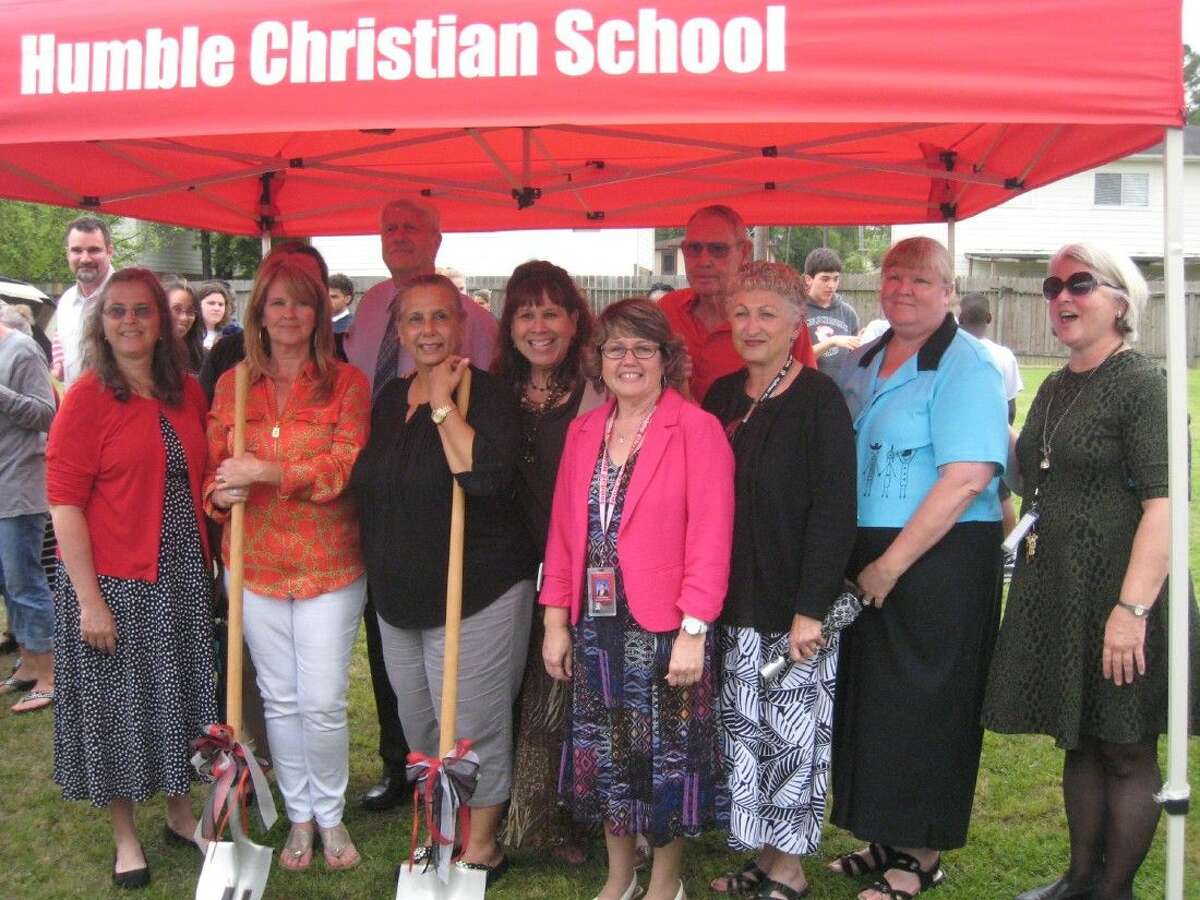 Teachers who have been with the school for its 15-year existence were honored during the groundbreaking of the school’s new gym Wednesday, March 30, 2016.