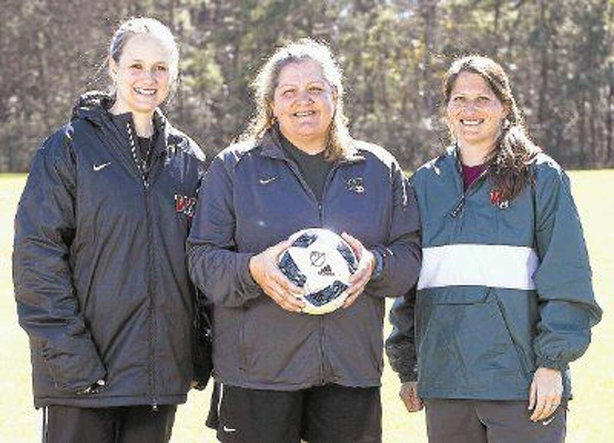The Woodlands girls soccer coaches (from left to right) Karen Lucas, Dina Graves, and Paige Jeanes pose for a portrait.