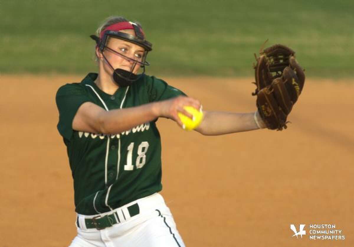 The Woodlands pitcher Emily Langkamp throws during the second inning of a District 16-6A softball game March 12, 2016