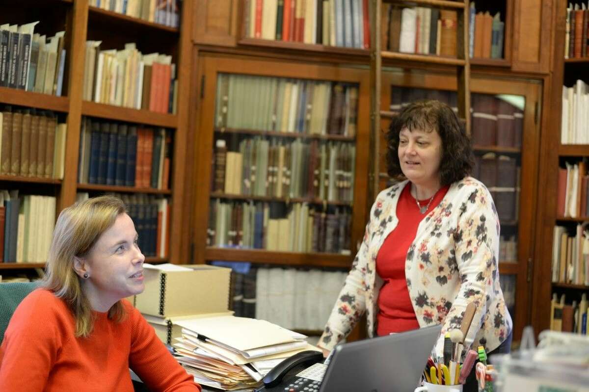 Librarian Lisa Struthers and San Jacinto Museum archivist Elizabeth Applebee keep the thousands of texts and items at the museum's library on file.