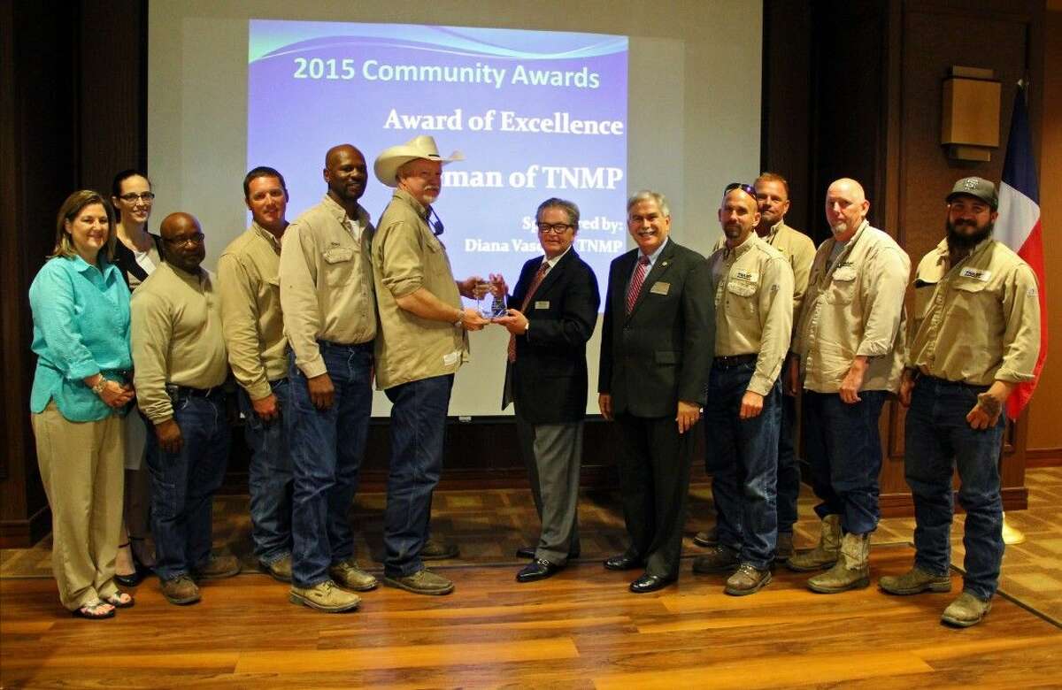 The Friendswood Chamber of Commerce Community Award of Excellence was presented to the linemen from the Texas New Mexico Power Company.