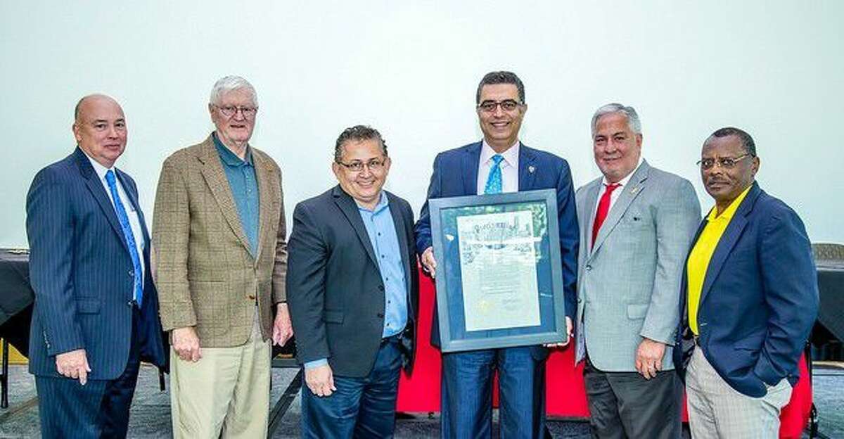 Houston Mayor Sylvester Turner proclaimed May 3 “Texas Center for Hispanic Achievement Day” in recognition of Lone Star College-University Park’s new effort that was announced at the Latino Education Summit III: Working for Change. Pictured with the proclamation, from left, LSC Chancellor Stephen C. Head, LSC Board Members Ron Trowbridge and Art Murillo, LSC-University Park President Shah Ardalan, American Latino Center for Research, Education & Justice President Richard R. Farias, and LSC Board Member Alton Smith.