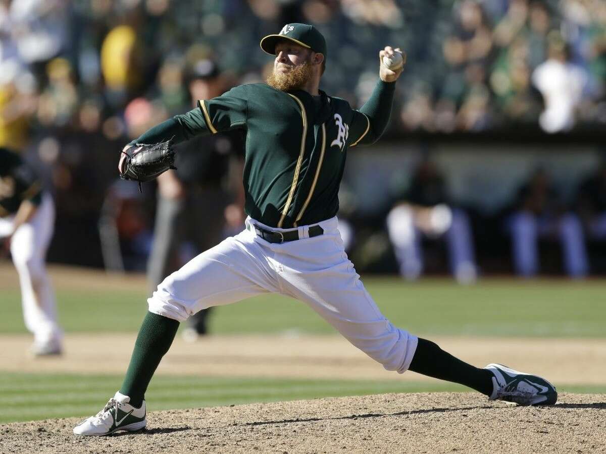 Athletics pitcher Sean Doolittle has been traded to the Nationals along with fellow reliever Ryan Madson.