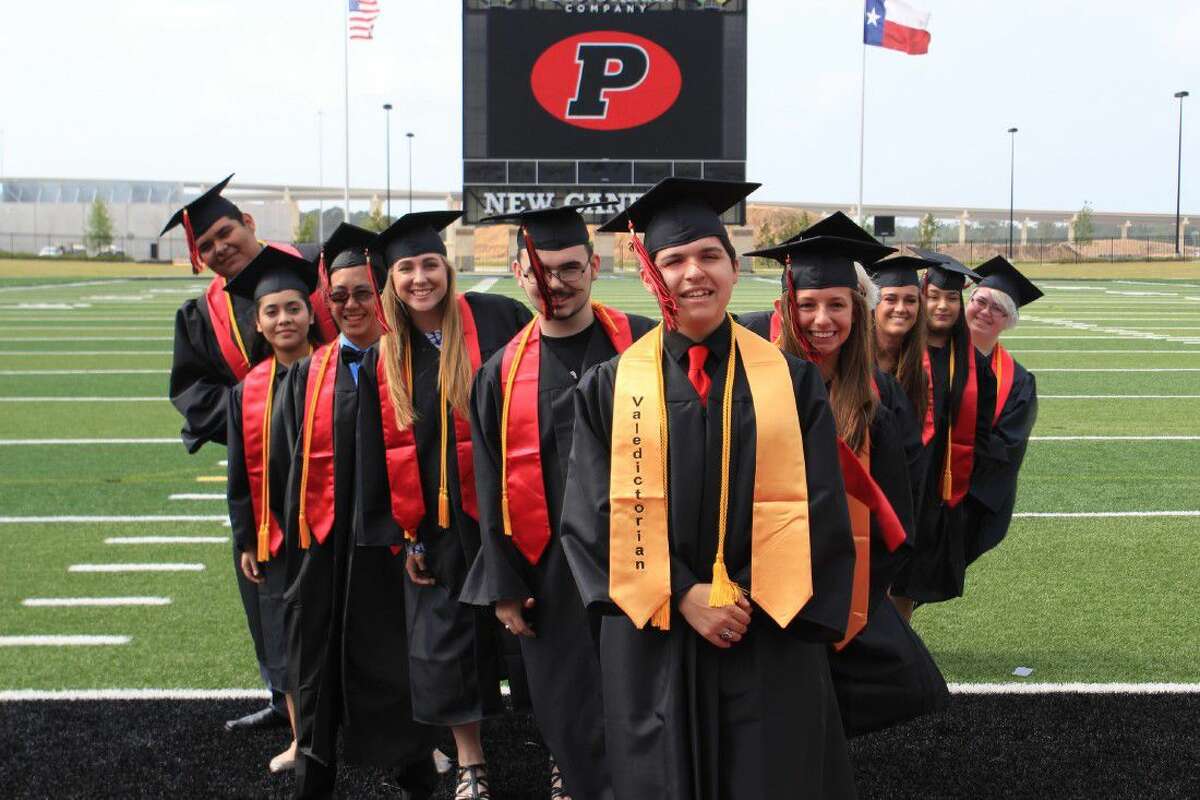 The top ten Porter High School graduates for 2016 pose at Texan Drive Stadium.
