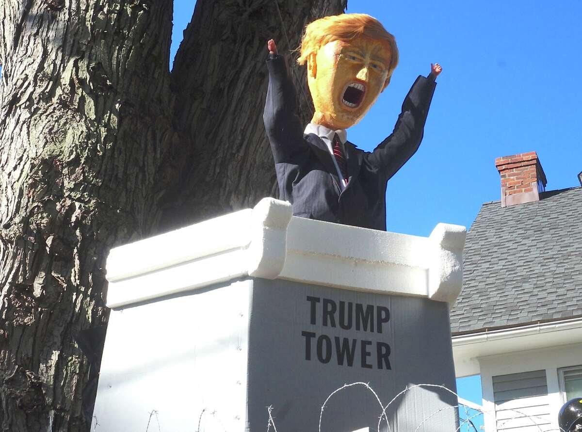 The West Hartford home of Matthew Warshauer depicts a "Trump Wall" this Halloween, a jab at presidential candidate Donald Trump's promise to have a wall built along the U.S.-Mexico border. The display also pokes fun at Senator Bernie Sanders and presidential candidate Hillary Clinton. (Photo: Ronni Newton, we-ha.com)